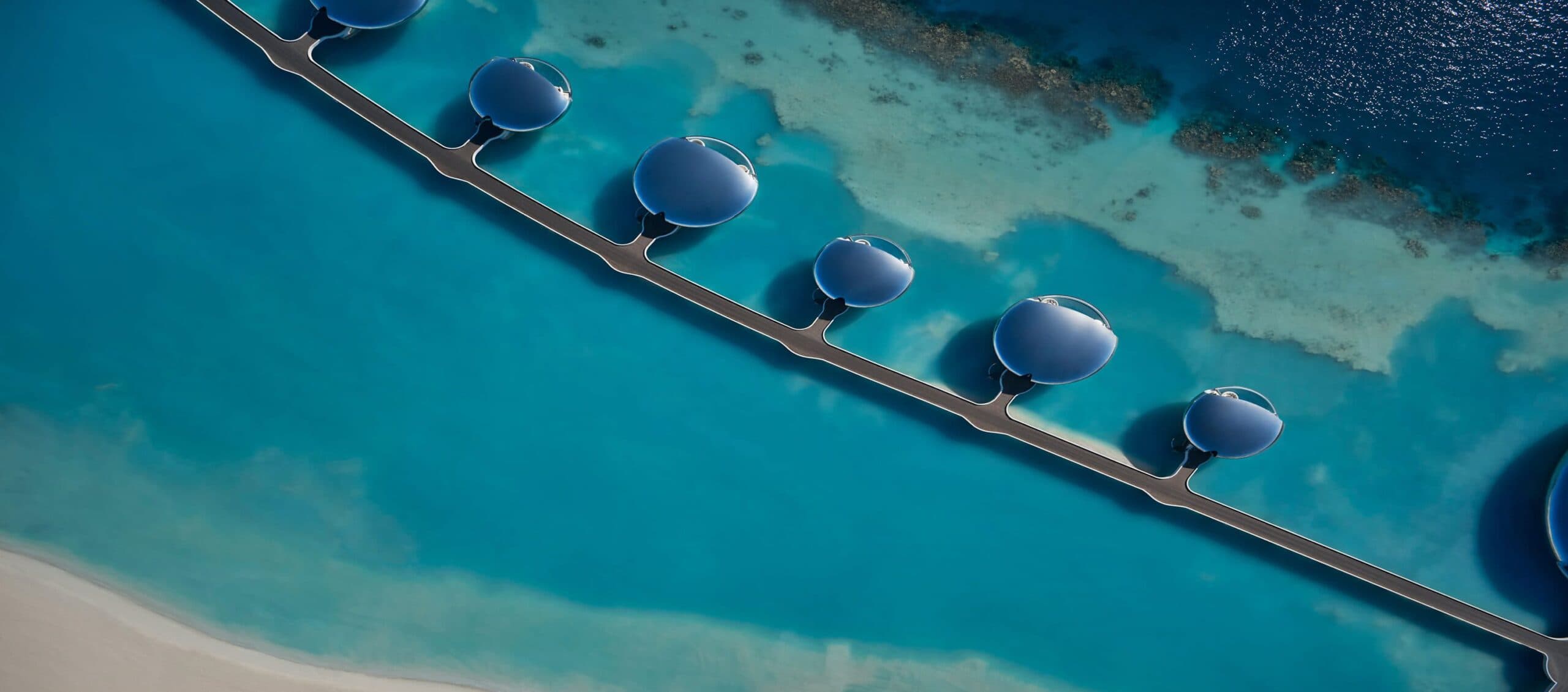 Overwater bungalow at sunset